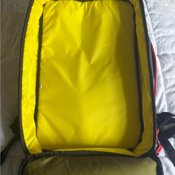 Topo Designs Backpack in Black, Red, and Yellow - Picture 3 of 10